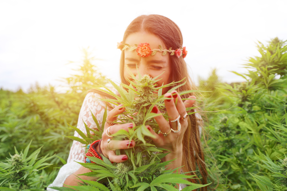 woman smelling hemp flower