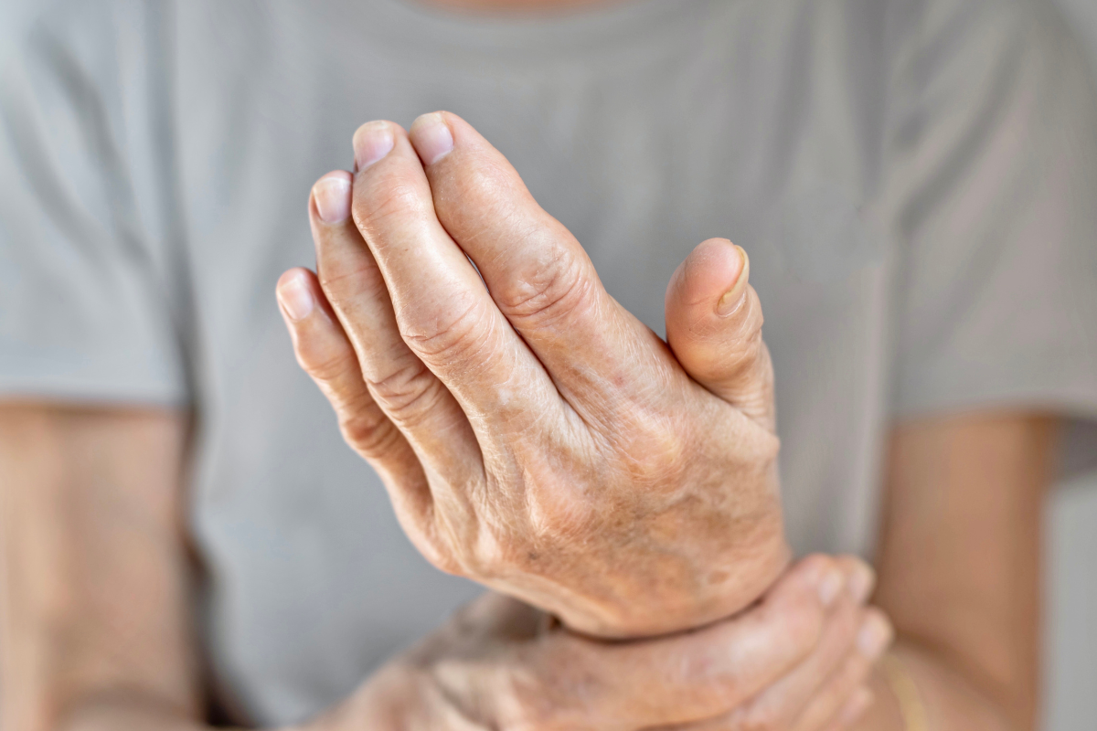 Man grabbing his wrist in pain