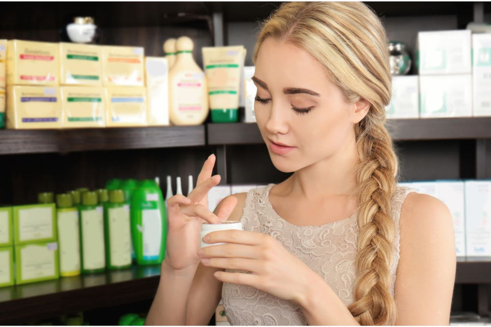 woman trying balm in store